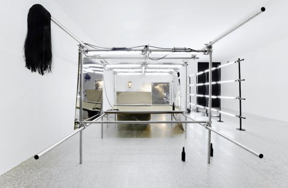 PEPO SALAZAR Untitled Installation (La fiesta de los metales), 2009 Fluorescent tube, stainless steel, 2G, paint, DM, stainless steel sheets, tripods/lamps, wig, botles.